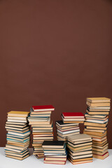 science a lot of books on a brown background reading in the library in the knowledge room