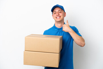 Young delivery Brazilian man isolated ops white background giving a thumbs up gesture