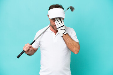 Middle age caucasian golfer player man isolated on blue background with tired and sick expression