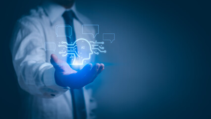 Businessman showing robot icon, ask questions, find answers, interact conversation and learn new technology,Chatbot Concept Innovation of Future or (AI) artificial intelligence robot technology