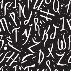 Vector random seamless pattern grunge letters on a black background. Hand drawn letters. Abstract English letters on black background.