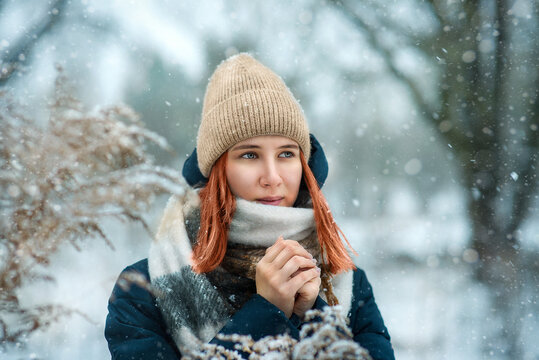 Portrait of a girl in winter in the park