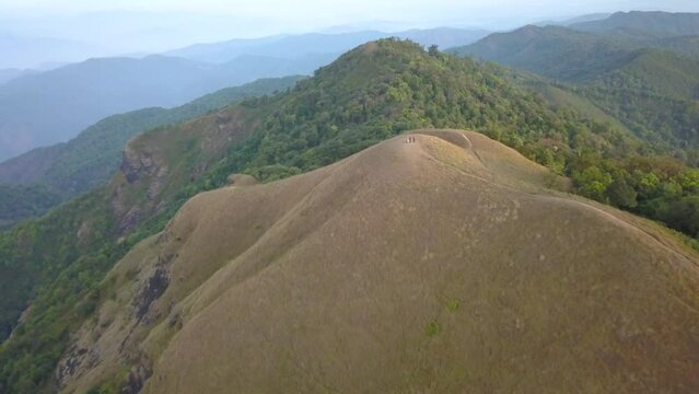 Aerial View. Flying over the high mountains, name Doi Mon Jong with beautiful sunset time in Chiang mai, Thailand.
