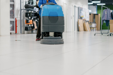cleaning floor with machine	