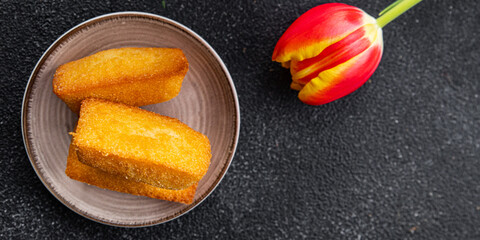 cake financier almond taste sweet dessert biscuit cake healthy meal food snack on the table copy space food background rustic top view