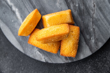 cake financier almond taste sweet dessert biscuit cake healthy meal food snack on the table copy space food background rustic top view