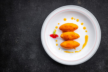 quenelle meat beef, veal tomato sauce healthy meal food snack on the table copy space food background rustic top view