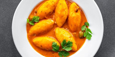 quenelle meat beef, veal tomato sauce healthy meal food snack on the table copy space food background rustic top view