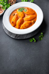 quenelle meat beef, veal tomato sauce healthy meal food snack on the table copy space food background rustic top view