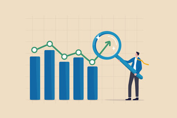 Trend analysis, marketing and sales information, analyze or predict trend line or profit, business forecast report concept, businessman analyst analyze trend graph and chart with magnifying glass. - obrazy, fototapety, plakaty