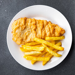 fish and chips deep fried fast food french fries takeaway meal food snack on the table copy space food background rustic top view