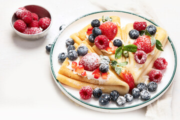 Healthy breakfast, homemade traditional crepes or pancakes