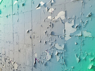 Texture, pattern, background. old paint. Concrete wall cracked paint, paint abstractly behind the concrete. With white tone paint flakes off over time