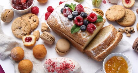 Set of delicious confectionery products. Holiday cakes. Top view, rotation. Sweet desserts table
