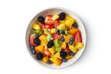 Bowl of healthy fresh summer mixed fruit salad isolated on white background. Delicious and wholesome food plate