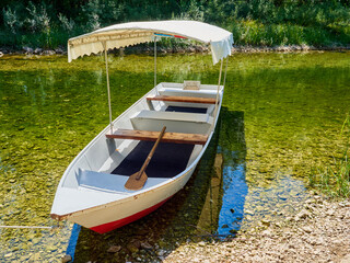 Boat in Rijeka Crnojevica, used to make touristic trips in Lake Skadar. Lake Skadar National Park, Montenegro, Europe