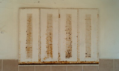 rusty shutters. Rusty shutter made of iron in an old house that needs to be replaced.  spoils the appearance of the house, needs to be replaced with a new and high quality shutter technology