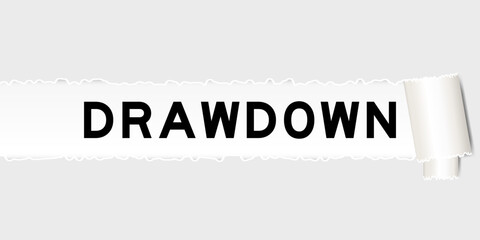 Ripped gray paper background that have word drawdown under torn part