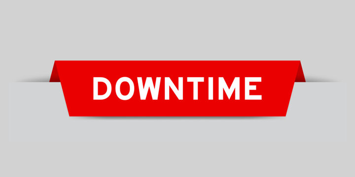 Red color inserted label with word downtime on gray background