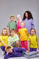 a group of happy multiethnic children look at camera isolated white background, friendship family togetherness, closeness