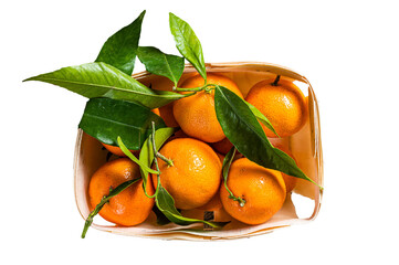 Fresh organic Tangerines, mandarins in wooden box from supermarket.  Isolated, transparent...
