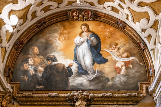 Seville, Spain - March 11, 2023: Painting The Apparition of the Imaculate Conception to Six Figures by Bartolome Esteban Murillo, inside the Church of Santa Maria la Blanca. Oil on canvas (1665)