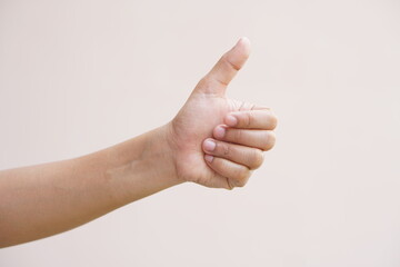 Asian woman doing her hand as a great sign