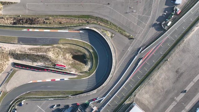 An exhilarating aerial view of the Hugenholtzbocht, one of the fastest and most challenging turns on the Zandvoort circuit.