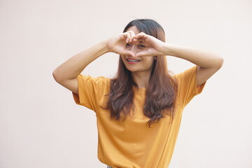 Fototapeta premium Asian woman smiles happily, brightly, cute