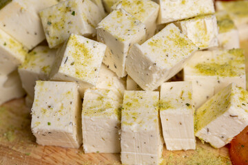 sliced white cottage cheese with spices