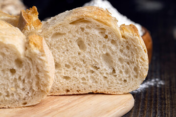 Sliced wheat loaf of fresh bread