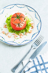 stuffed tomato North Sea shrimp, classic Belgian dish vertical overhead shot