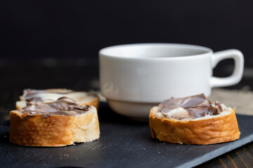 Sweet chocolate butter spread on a baguette