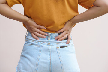 Asian woman having waist pain