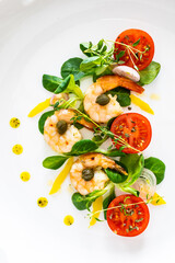 Prawn salad on wooden table
