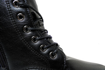 Black laces on leather shoe.On white background.