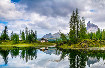 Amazing Lago Di Federa See with beautiful reflection. Majestic Landscape with Dolomites peak, Cortina D'Ampezzo, South Tyrol, Dolomites, Italy. Travel in nature. Artistic picture. Beauty world.