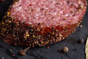 Sliced salami using pork meat with spices