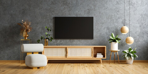 TV and wooden cabinet with gray armchair in modern living room the concrete wall.