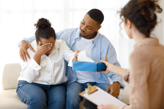 Black Man Comforting Crying Wife, Couple Attend Family Therapy