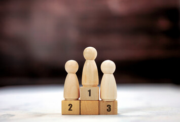 Achievement concept. Wooden podium 1, 2, 3, human standing on podium with ranking winner business...