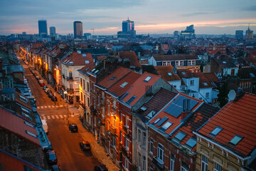 Brussels rooftops in romantic evening lights in Belgium capital