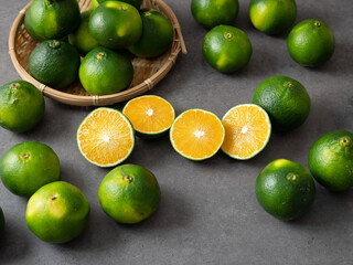 Fresh tangerines on gray background	