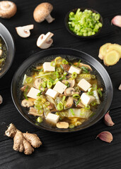 Cabbage Tofu Soup with mushrooms and spring onion.
