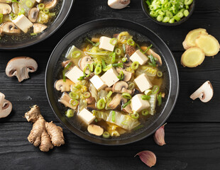 Cabbage Tofu Soup with mushrooms and spring onion.