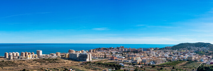 Fototapeta premium Stunning Aerial Panorama of Sunny Oropesa del Mar, Spain: Mediterranean Coastline and Beach Townscape