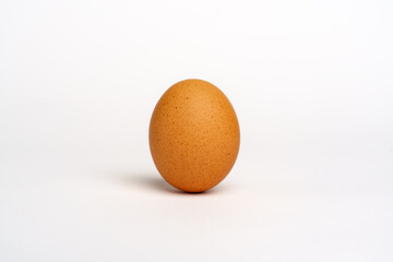 Egg brown,  isolated on white background.