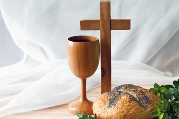 Cross, chalice with wine and bread, Last Supper and Passion of Christ concept
