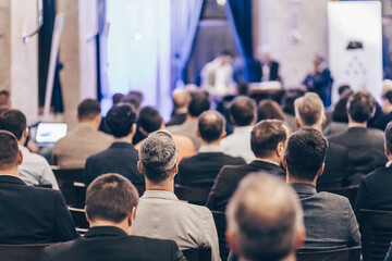 Obraz premium Round table discussion at business convention and Presentation. Audience at the conference hall. Business and entrepreneurship symposium.
