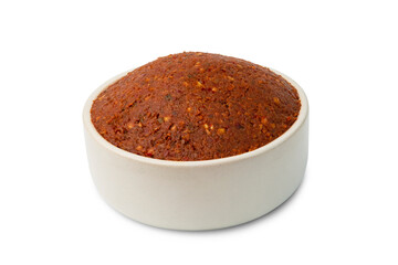 Thai red curry paste in white bowl isolated on white background with clipping path